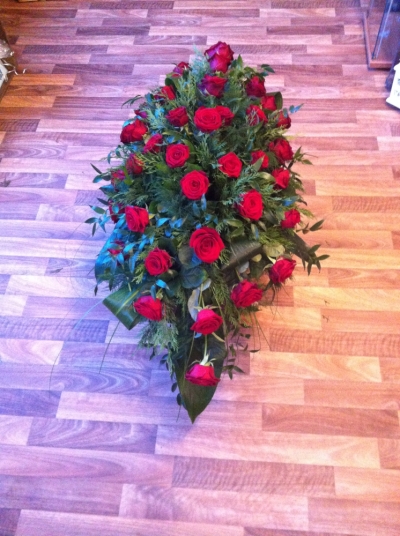 Red Rose Coffin Spray - These Beautiful scented Roses with the lovely textured Foliage look stunning on a Coffin